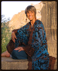 Nicki Scully sitting on some ancient Egyptian carved stones